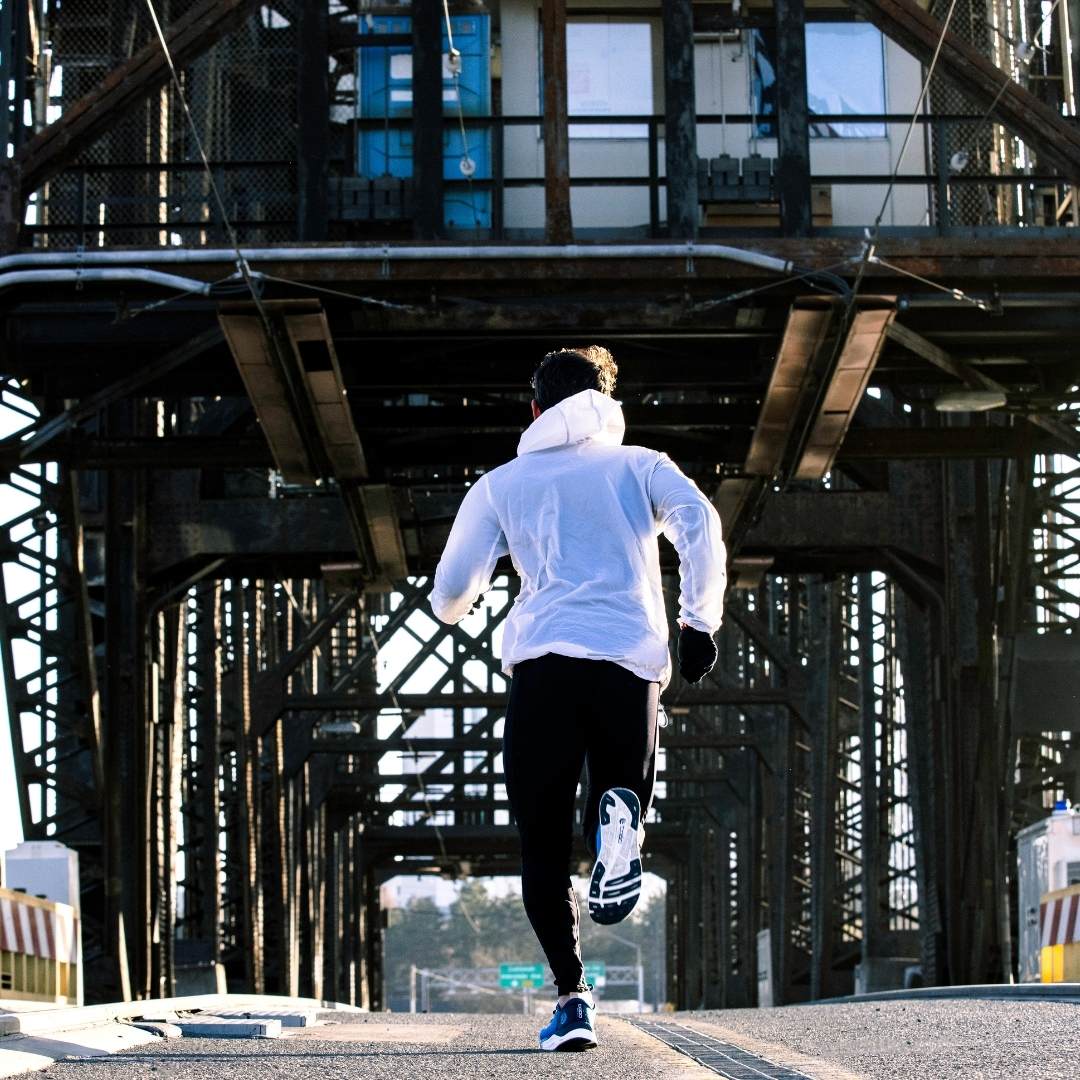 Topo, löpare på en bro, road running